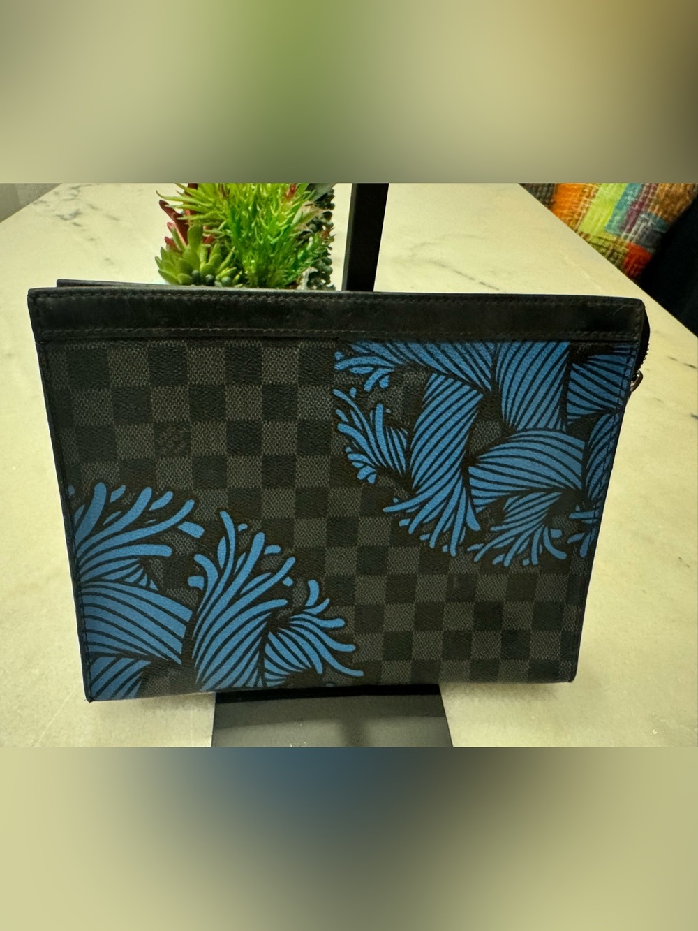 LV Pochette Jour GM clutch in Damier Graphite canvas featuring a blue "Rope"